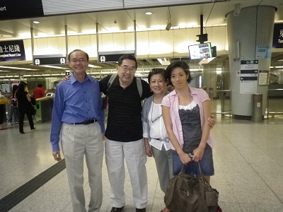 Ed, his wife and daughter with Jim in Kowloon